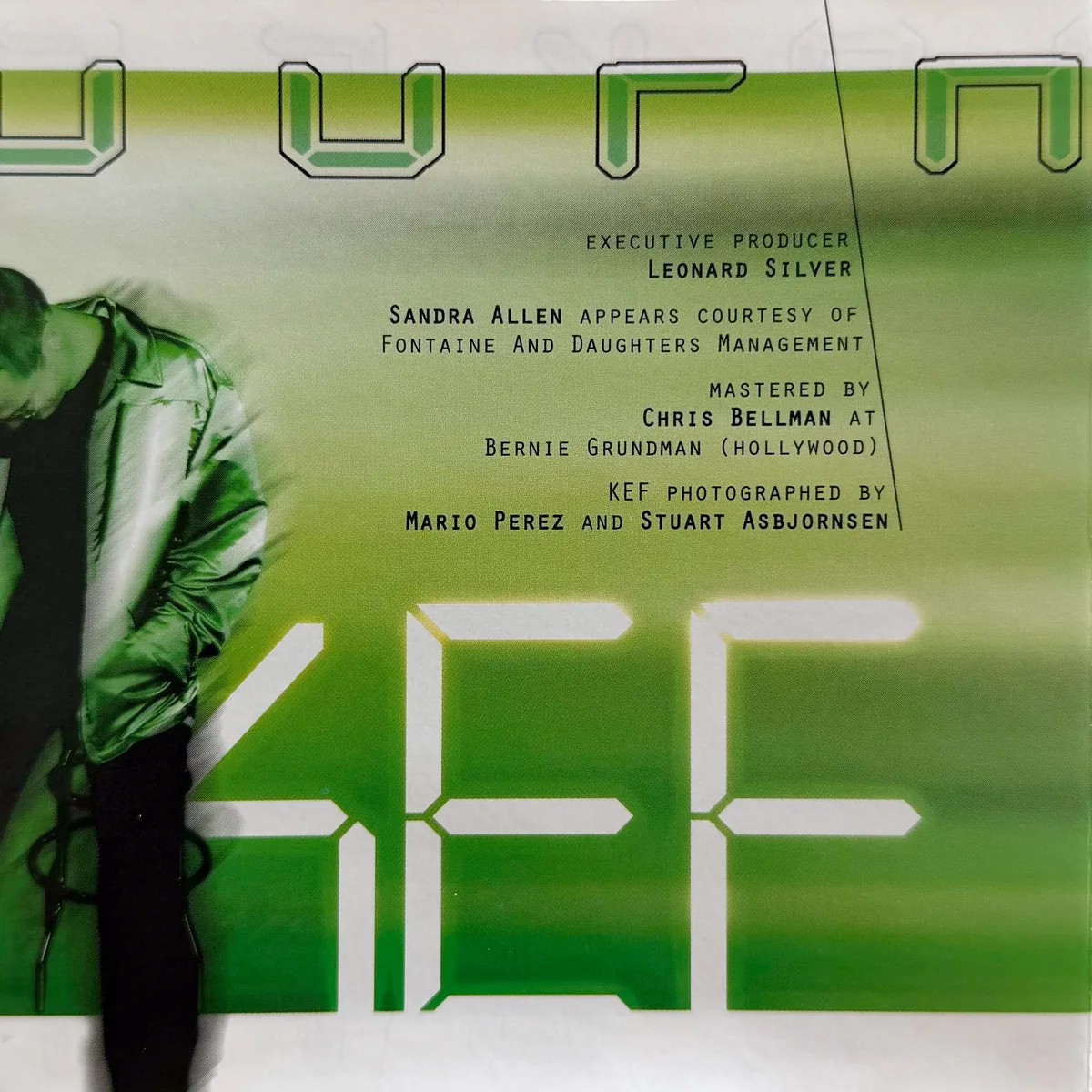Poppaloopa booklet panel with the executive producer, mastering and photography credits over a large KEF logo