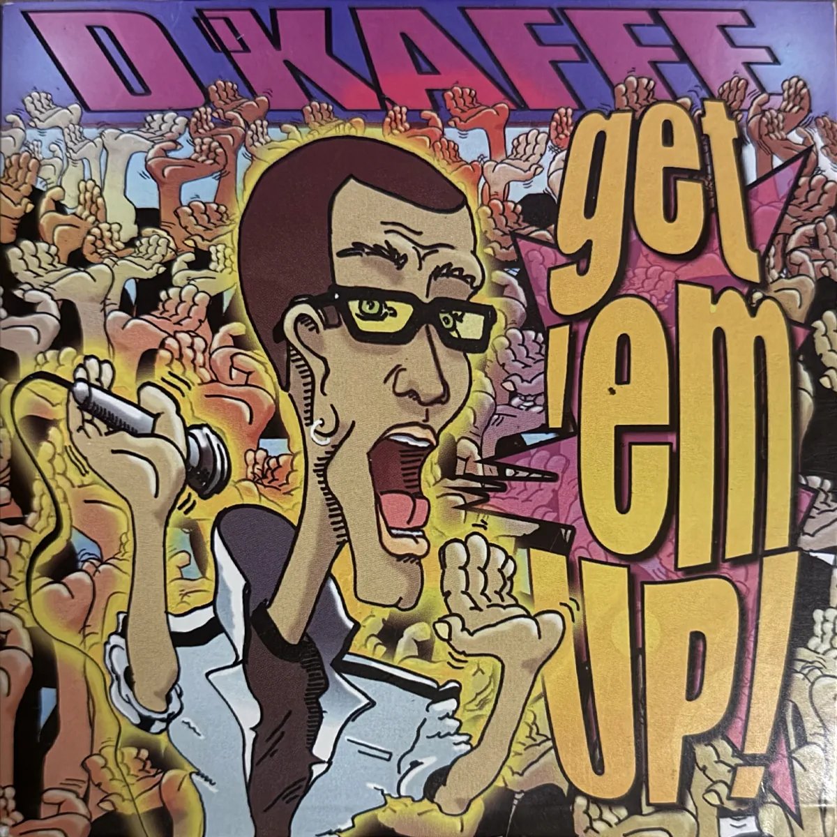 Get ’Em Up cover: a cartoon of D’Kaffe in yellow glasses shouting into a microphone in front of a crowd of raised hands, with the title in big yellow letters